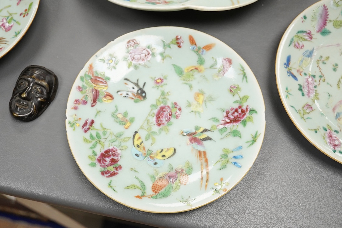 A Japanese bronze mask and four famille rose dishes - largest 29cm